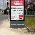 publicité pour le jeu des 1000 euros à Fleury (mars 2016)